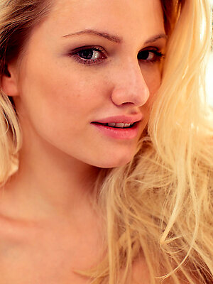 Watch Monique C tease out of her clothes while she gets ready in a mirror.