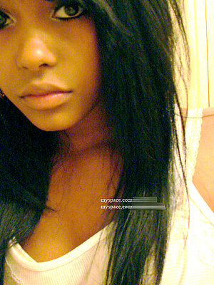 Neat mulatto cutie posing in hot pictures