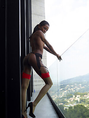 You have a excellent view from this veranda! But the naked girl is more excited!