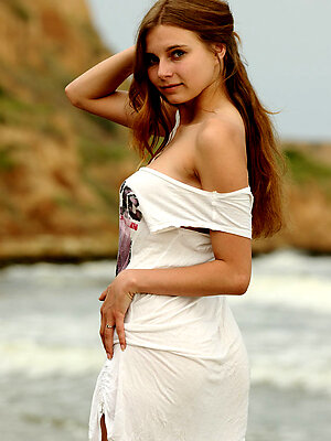 Yuki shows off her gorgeous, flexible body at the beach.