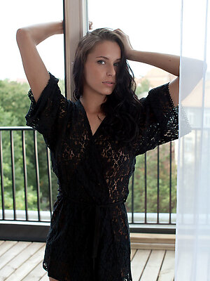 Diana G look ravishing as she sensually strips her black lacey robe and panty to flaunt her amazingly flexible body.