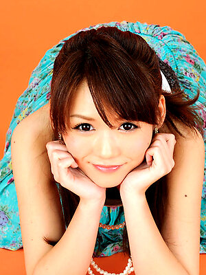 Yumi Asian honey on heels and with big eyes is elegant and sexy